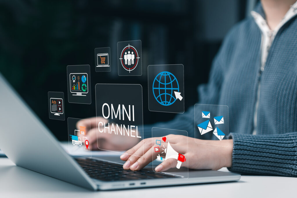 image showing different marketing channels floating around a laptop.